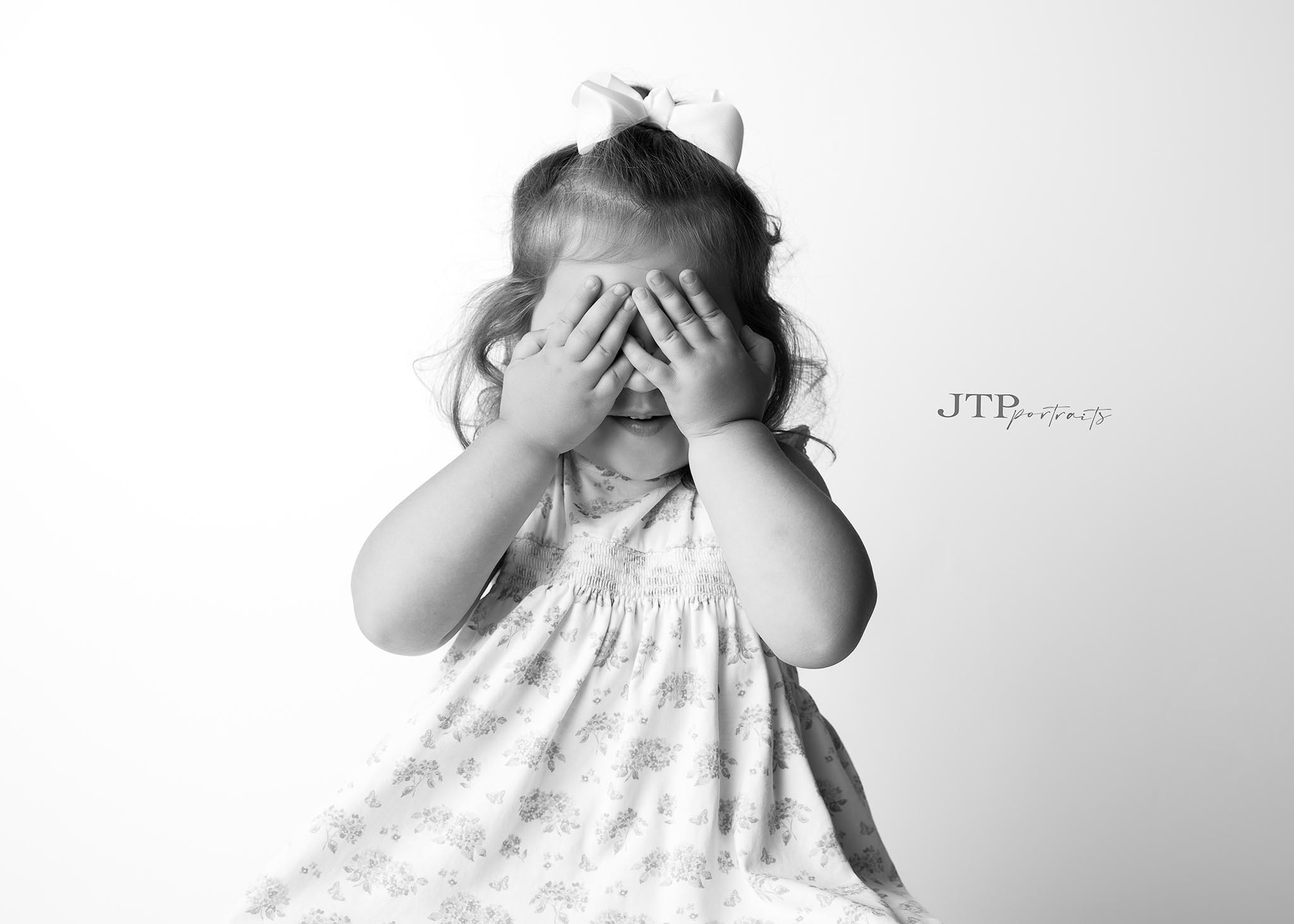 Black & White Mugshot Too Cute for Jail! Our most talked-about mini! A playful twist featuring adorable “mugshots” of your little mischief-maker.